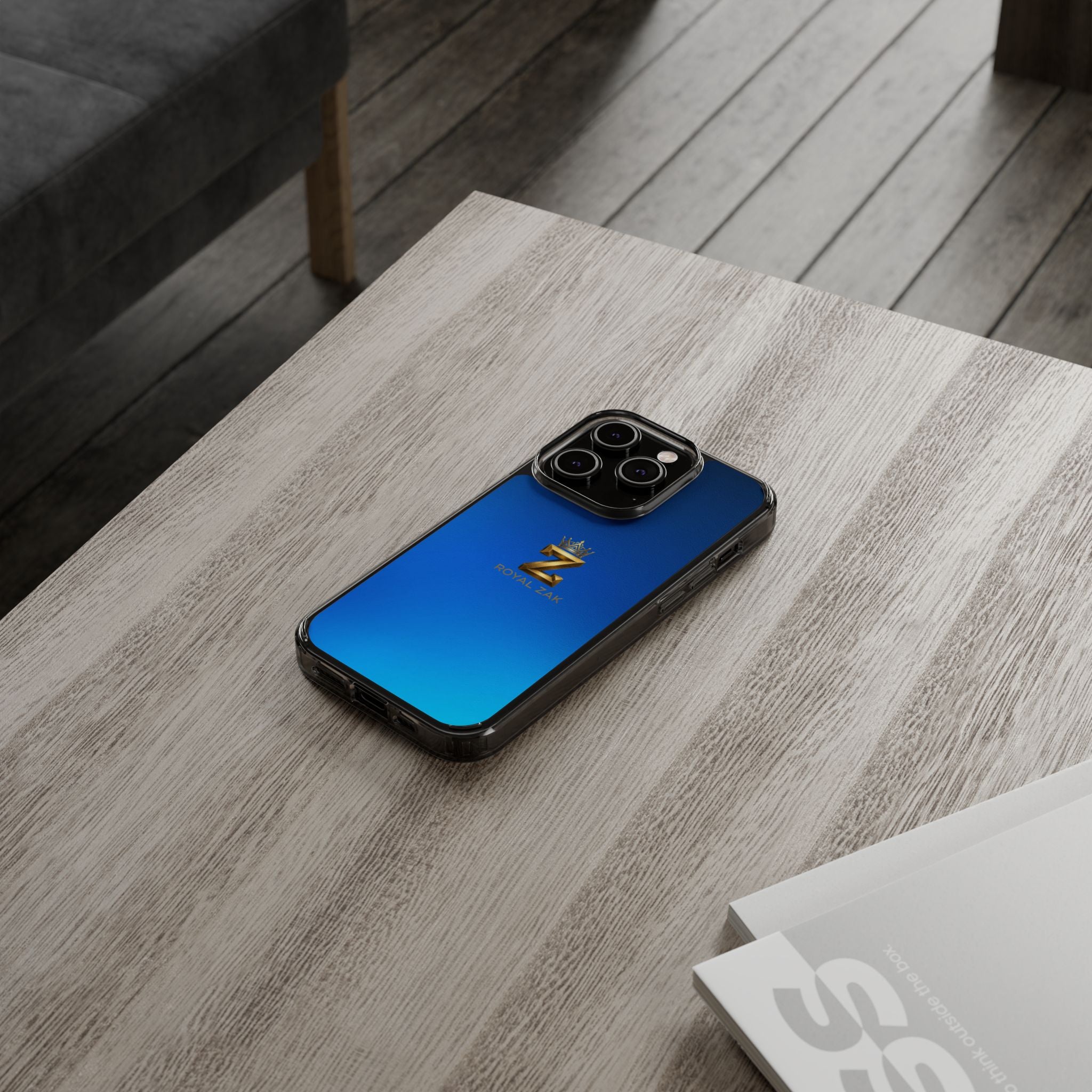 Clear Impact-Resistant Phone Case — Blue Gradient with Gold “Royal Zak” Crown Logo