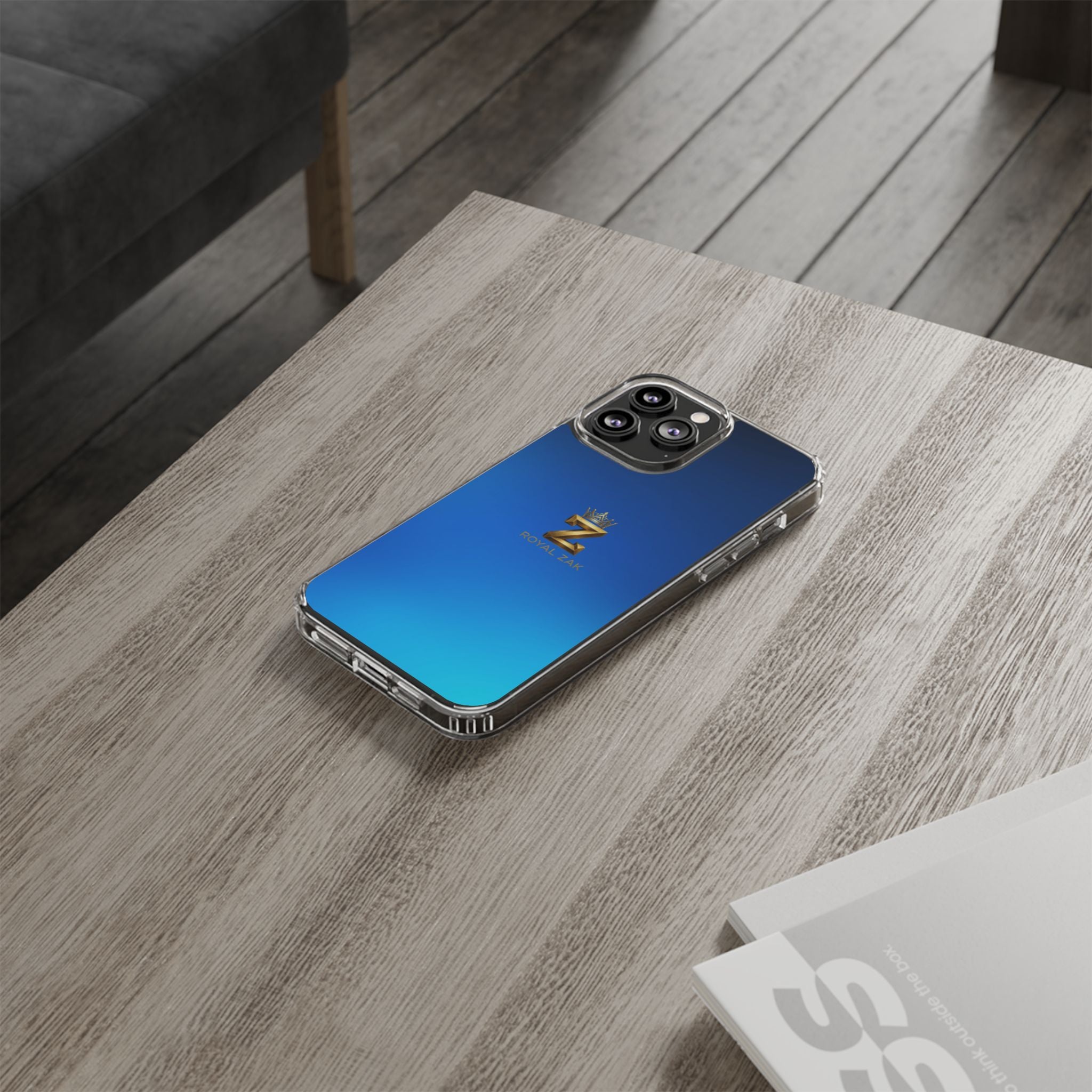 Clear Impact-Resistant Phone Case — Blue Gradient with Gold “Royal Zak” Crown Logo